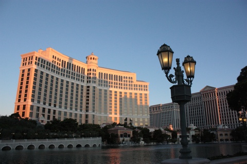 Las Vegas glmaour Bellaggion in the sunrise. In the bac you can see a glimpse of Caesars' Palace